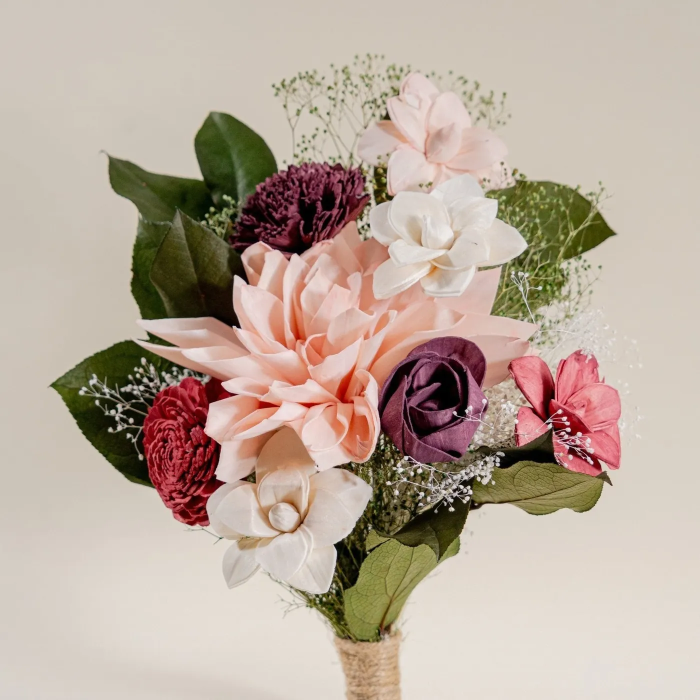 Wild style bridesmaid bouquet with pink lilies and burgundy blooms
