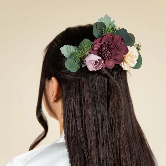 Luxe Lavender hairpiece worn in dark hair, seen from behind